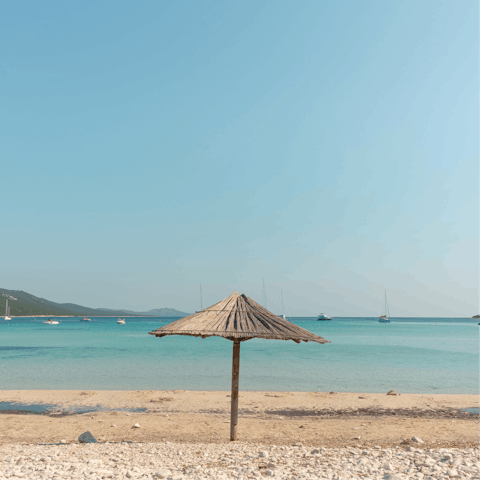 Walk 900 metres to the sandy Kalathas Beach for a spot of sunbathing