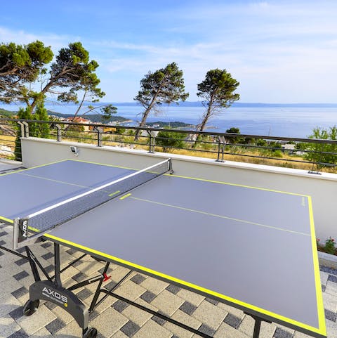 Host a family championship games with the table tennis, table football and darts board