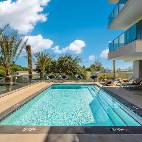 Enjoy refreshing dips in the communal pool
