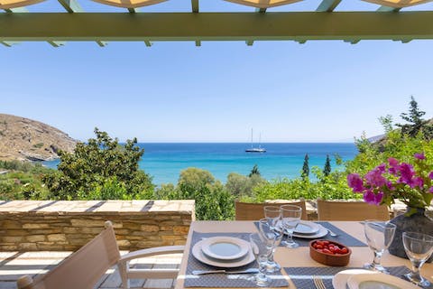 Dine alfresco as you drink in the sea views from the shaded terrace