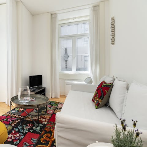 Put your feet up in the bright living space and sip a glass of green wine