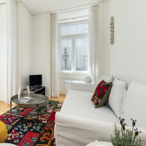 Put your feet up in the bright living space and sip a glass of green wine