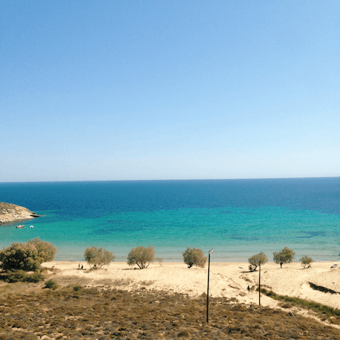 Seek out the sun, sand and sea at Porto Koundouros semi-private beach, just 150m away