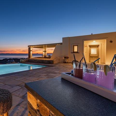 Sip drinks made from your own poolside bar