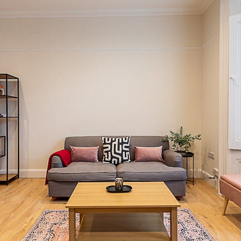 Kick back in the stylish living space with a gin and tonic