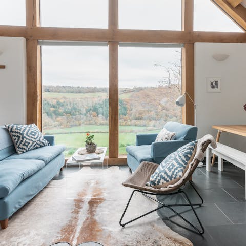 Look out over the Wye Valley from the wall of glass in the living room