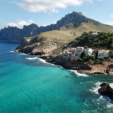 Enjoy a dip at Cala San Vicente – it's a ten-minute drive
