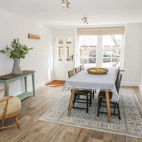 Tuck into a family meal around the dining table