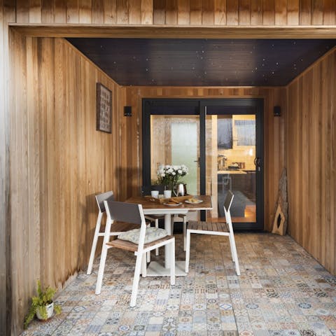 Take your morning coffee out onto the veranda, come rain or shine