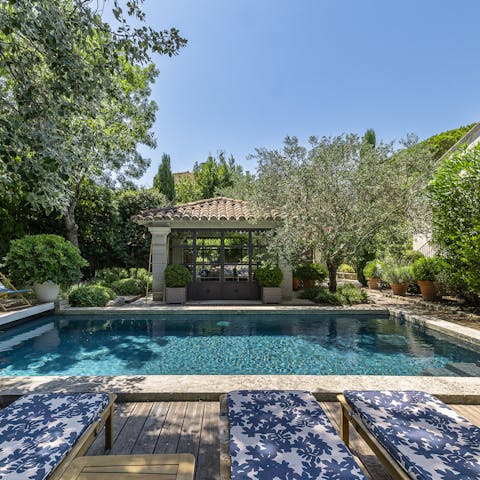 Sunbathe poolside in the leafy garden, south-facing for the best sunshine