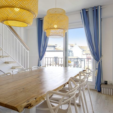 Gather for breakfast at the raw wood dining table