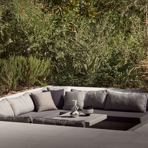 Gather in the seating area and toast to another idyllic day