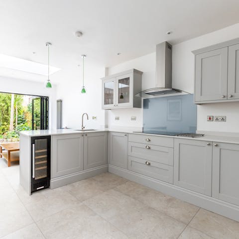 Cook a Sunday roast in the modern open-plan kitchen