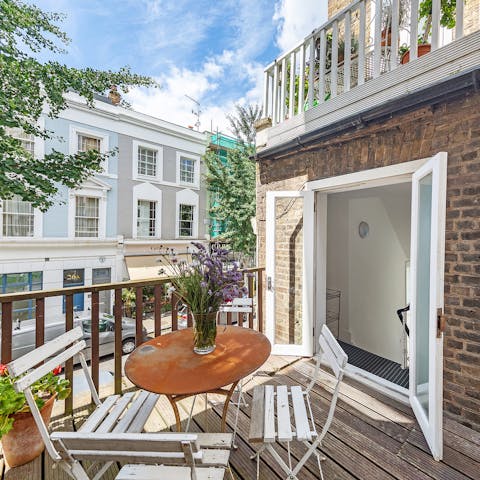 Enjoy lunch on your sunny, private balcony with views over Notting Hill