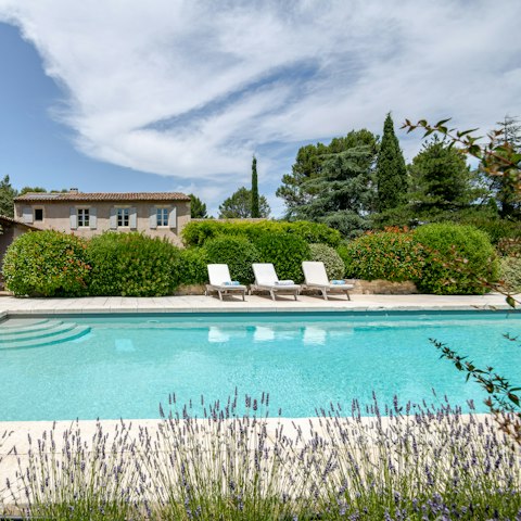 Sink into holiday mode by the poolside