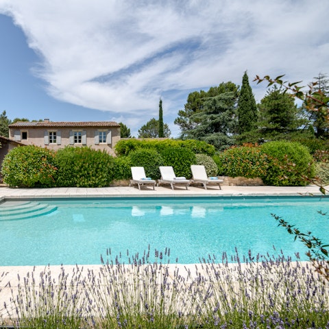 Sink into holiday mode by the poolside