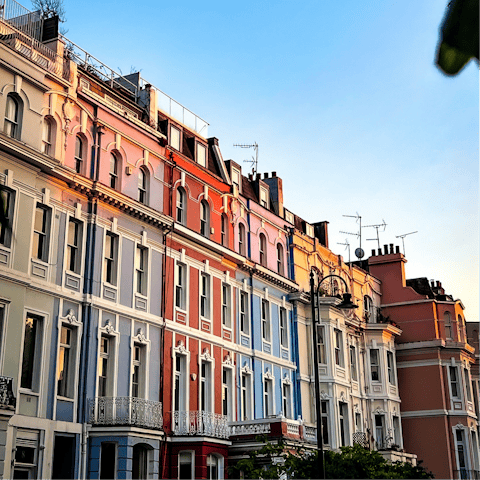 Wander Notting Hill's colourful streets, a fifteen-minute walk away