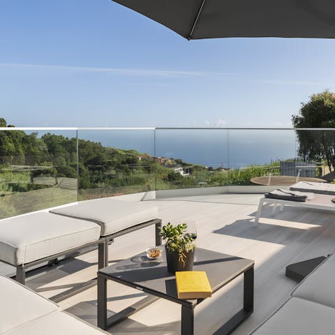 Sip sangria and admire the sea views on the terrace