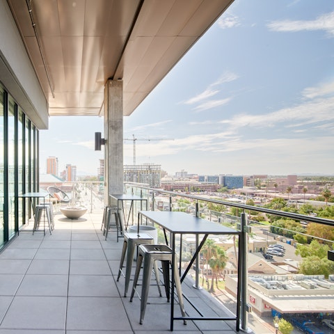 Observe the town from the building's terrace on high