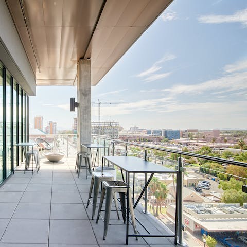 Observe the town from the building's terrace on high