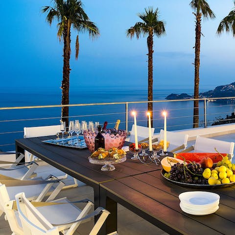 Tuck into meals around the outdoor dining table