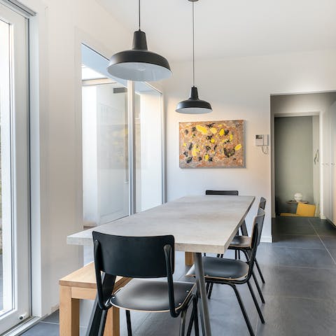 Gather together in the light-filled dining area for a celebratory feast