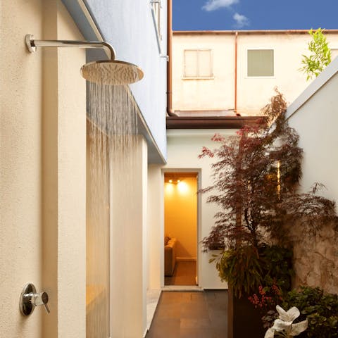 Cool off beneath the courtyard garden's outdoor shower