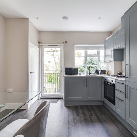 Fire up the coffee pod machine in the dining kitchen