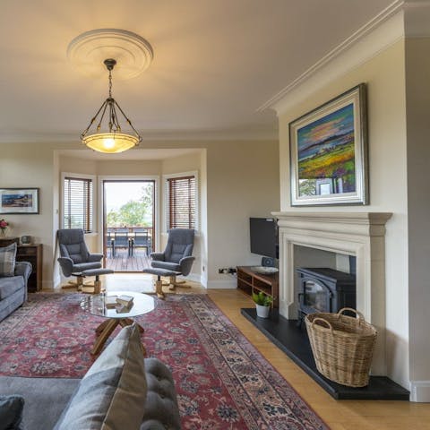 Light the fire and gather for cosy evenings in the living room