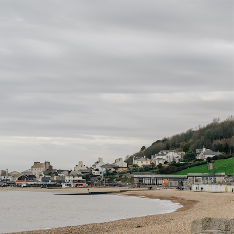 Splash in the sea at Lyme Regis Front beach