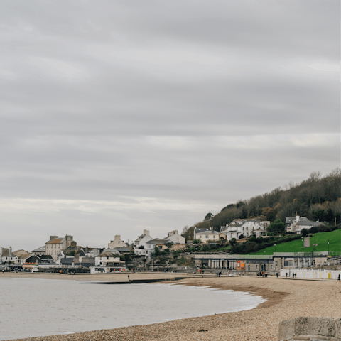Splash in the sea at Lyme Regis Front beach