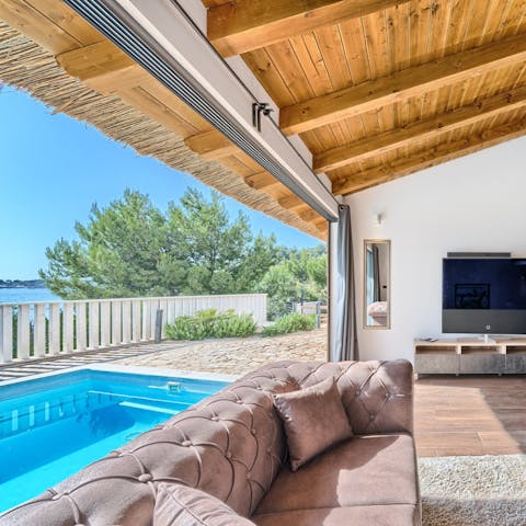 Open the sliding doors and listen to sound of the waves