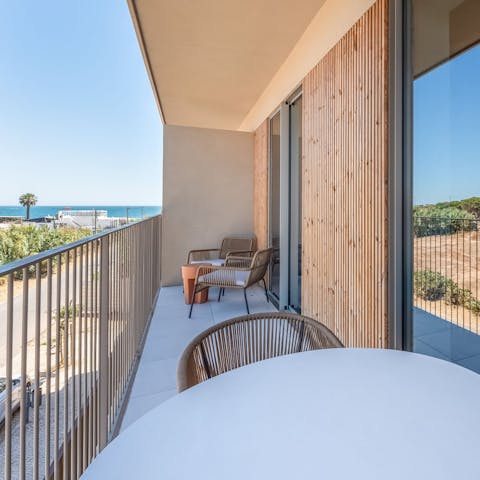 Admire the views of the Atlantic Ocean from the private balcony