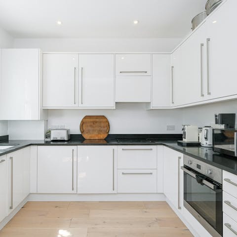 Whip up a delicious home-cooked meal in the sleek, modern kitchen