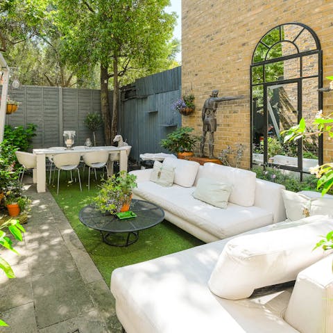 Relax with a glass of wine in the peaceful garden