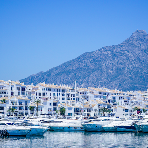 Stroll along Marbella's Golden Mile, just ten minutes away by car