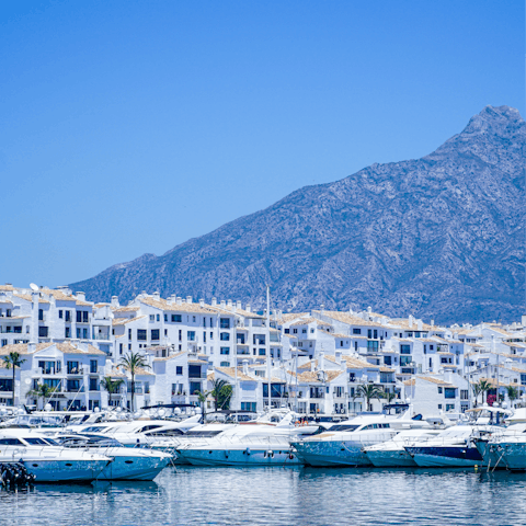 Stroll along Marbella's Golden Mile, just ten minutes away by car