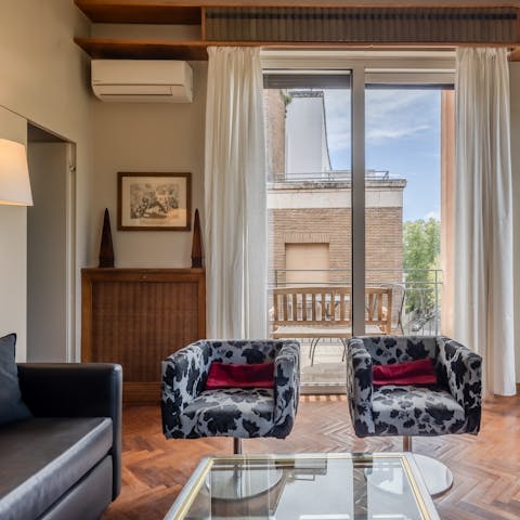 Admire the quirky design touches like the cow print chairs