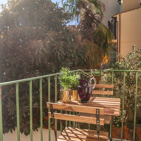Enjoy an espresso and plan your itinerary out on the balcony