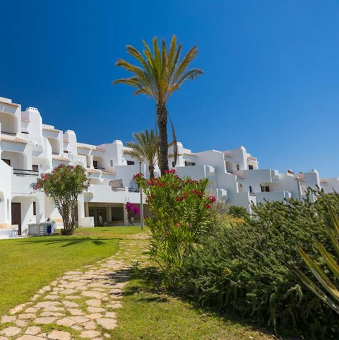 Stroll through the beautifully landscaped communal gardens
