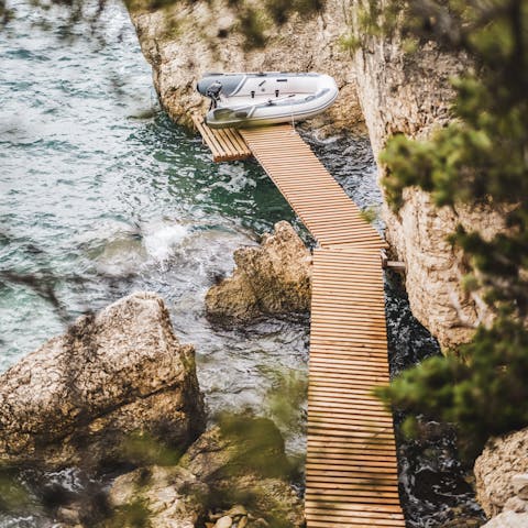 Head out on a boat trip from the private jetty