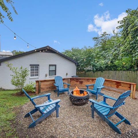 Gather around the fire pit in the shared backyard