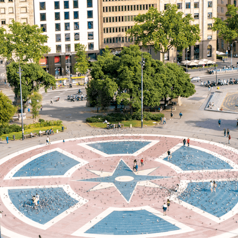 Take the gentle ten minute walk to Plaça de Catalunya