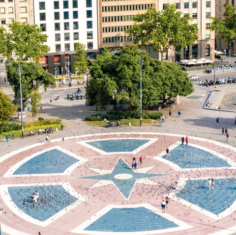 Take the gentle ten minute walk to Plaça de Catalunya