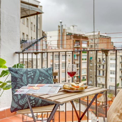 Enjoy a glass of wine or two on the balcony
