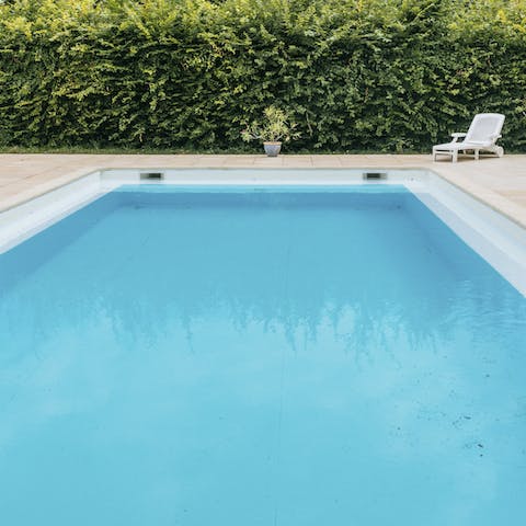 Notch up the lengths in the chateau's swimming pool