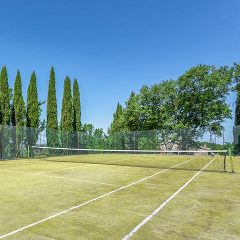 Practise your serve on the private tennis court