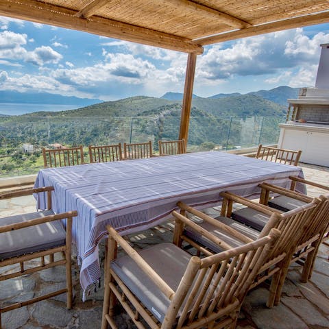 Dine together on gyros and Greek salad as the sun goes down