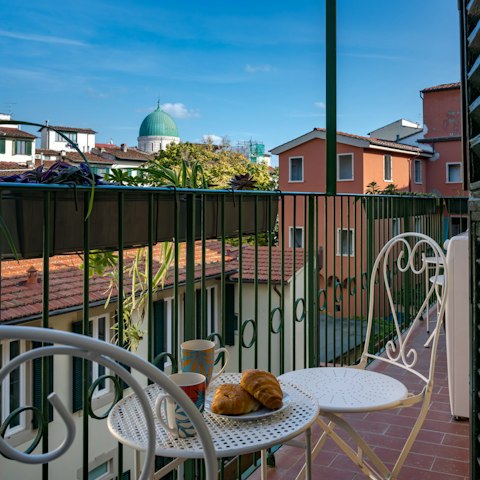 Enjoy breakfast on the cosy private balcony