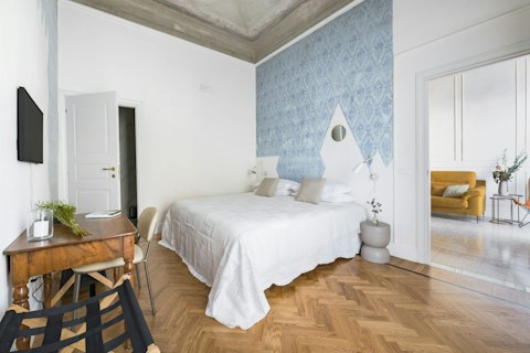 Drift into a blissful sleep in the serene bedroom